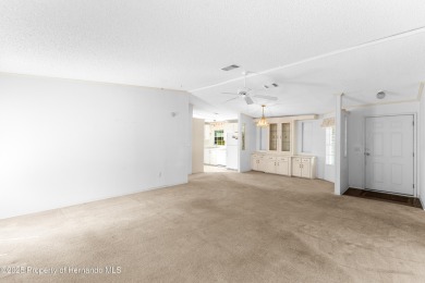 This 3 bedroom, 2 bath property is a lovely place to call homee on Brookridge Country Club in Florida - for sale on GolfHomes.com, golf home, golf lot