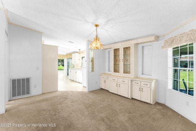 This 3 bedroom, 2 bath property is a lovely place to call homee on Brookridge Country Club in Florida - for sale on GolfHomes.com, golf home, golf lot