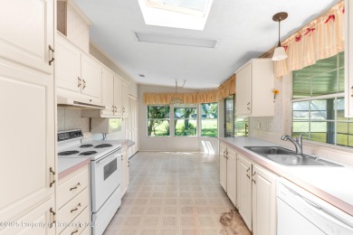 This 3 bedroom, 2 bath property is a lovely place to call homee on Brookridge Country Club in Florida - for sale on GolfHomes.com, golf home, golf lot