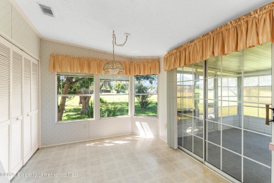 This 3 bedroom, 2 bath property is a lovely place to call homee on Brookridge Country Club in Florida - for sale on GolfHomes.com, golf home, golf lot