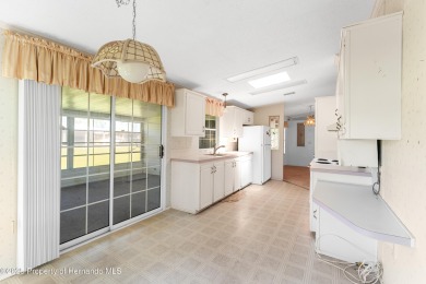 This 3 bedroom, 2 bath property is a lovely place to call homee on Brookridge Country Club in Florida - for sale on GolfHomes.com, golf home, golf lot