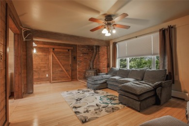 Bordered by the peaceful waters of Tenmile Creek, this 3.23-acre on Green Meadow Country Club in Montana - for sale on GolfHomes.com, golf home, golf lot