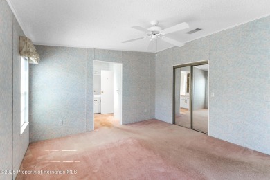 This 3 bedroom, 2 bath property is a lovely place to call homee on Brookridge Country Club in Florida - for sale on GolfHomes.com, golf home, golf lot