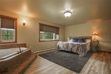 Bordered by the peaceful waters of Tenmile Creek, this 3.23-acre on Green Meadow Country Club in Montana - for sale on GolfHomes.com, golf home, golf lot