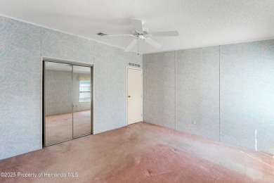 This 3 bedroom, 2 bath property is a lovely place to call homee on Brookridge Country Club in Florida - for sale on GolfHomes.com, golf home, golf lot