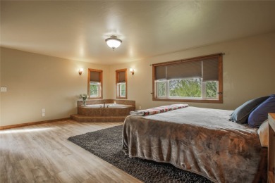 Bordered by the peaceful waters of Tenmile Creek, this 3.23-acre on Green Meadow Country Club in Montana - for sale on GolfHomes.com, golf home, golf lot