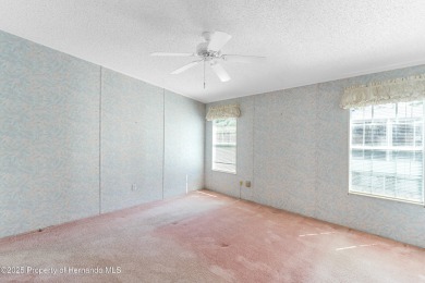 This 3 bedroom, 2 bath property is a lovely place to call homee on Brookridge Country Club in Florida - for sale on GolfHomes.com, golf home, golf lot
