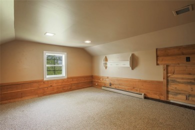 Bordered by the peaceful waters of Tenmile Creek, this 3.23-acre on Green Meadow Country Club in Montana - for sale on GolfHomes.com, golf home, golf lot