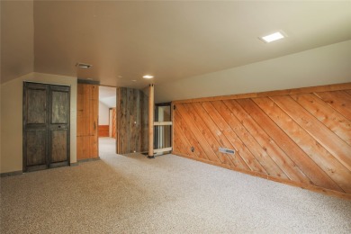 Bordered by the peaceful waters of Tenmile Creek, this 3.23-acre on Green Meadow Country Club in Montana - for sale on GolfHomes.com, golf home, golf lot