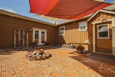 Bordered by the peaceful waters of Tenmile Creek, this 3.23-acre on Green Meadow Country Club in Montana - for sale on GolfHomes.com, golf home, golf lot