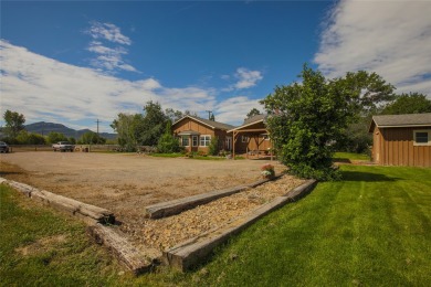 Bordered by the peaceful waters of Tenmile Creek, this 3.23-acre on Green Meadow Country Club in Montana - for sale on GolfHomes.com, golf home, golf lot