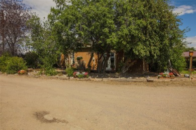 Bordered by the peaceful waters of Tenmile Creek, this 3.23-acre on Green Meadow Country Club in Montana - for sale on GolfHomes.com, golf home, golf lot