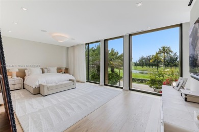Modern luxurious home overlooking a beautiful Golf Course. This on Miami Beach Golf Club in Florida - for sale on GolfHomes.com, golf home, golf lot