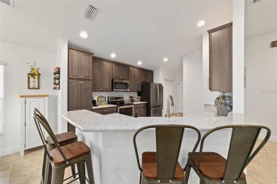 Like New Flamingo Model home with room for a pool, built in 2019 on Churchill Greens Executive Golf Course in Florida - for sale on GolfHomes.com, golf home, golf lot
