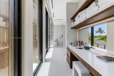 Modern luxurious home overlooking a beautiful Golf Course. This on Miami Beach Golf Club in Florida - for sale on GolfHomes.com, golf home, golf lot