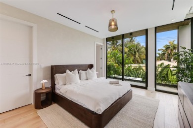 Modern luxurious home overlooking a beautiful Golf Course. This on Miami Beach Golf Club in Florida - for sale on GolfHomes.com, golf home, golf lot