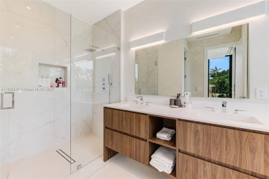Modern luxurious home overlooking a beautiful Golf Course. This on Miami Beach Golf Club in Florida - for sale on GolfHomes.com, golf home, golf lot