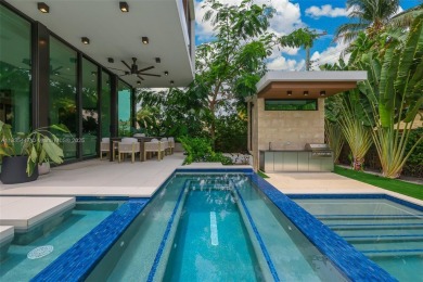 Modern luxurious home overlooking a beautiful Golf Course. This on Miami Beach Golf Club in Florida - for sale on GolfHomes.com, golf home, golf lot