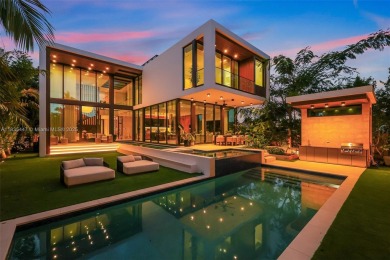 Modern luxurious home overlooking a beautiful Golf Course. This on Miami Beach Golf Club in Florida - for sale on GolfHomes.com, golf home, golf lot
