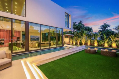 Modern luxurious home overlooking a beautiful Golf Course. This on Miami Beach Golf Club in Florida - for sale on GolfHomes.com, golf home, golf lot
