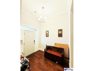 Experience refined living at 309 Dormie Lane, gracefully on The Members Club At Woodcreek in South Carolina - for sale on GolfHomes.com, golf home, golf lot