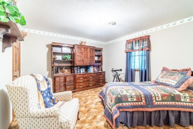 This 4 bedroom/2.5 bathroom home situated on a quiet cul-de-sac on Lake James Golf Club in Indiana - for sale on GolfHomes.com, golf home, golf lot