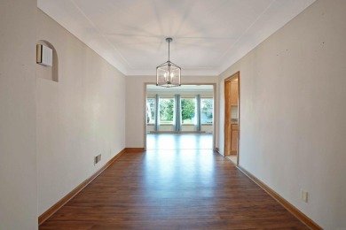 This charming ranch home offers more than meets the eye! With on Irv Warren Memorial Golf Course in Iowa - for sale on GolfHomes.com, golf home, golf lot