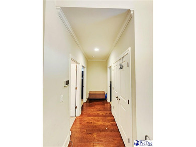 Experience refined living at 309 Dormie Lane, gracefully on The Members Club At Woodcreek in South Carolina - for sale on GolfHomes.com, golf home, golf lot