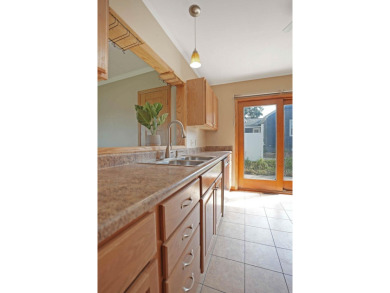 This charming ranch home offers more than meets the eye! With on Irv Warren Memorial Golf Course in Iowa - for sale on GolfHomes.com, golf home, golf lot