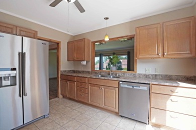 This charming ranch home offers more than meets the eye! With on Irv Warren Memorial Golf Course in Iowa - for sale on GolfHomes.com, golf home, golf lot