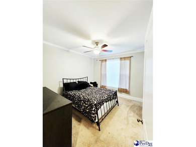 Experience refined living at 309 Dormie Lane, gracefully on The Members Club At Woodcreek in South Carolina - for sale on GolfHomes.com, golf home, golf lot