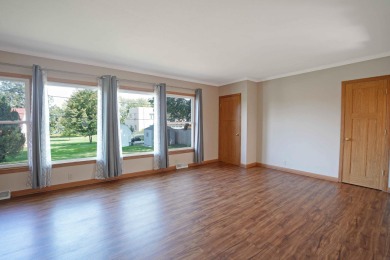 This charming ranch home offers more than meets the eye! With on Irv Warren Memorial Golf Course in Iowa - for sale on GolfHomes.com, golf home, golf lot