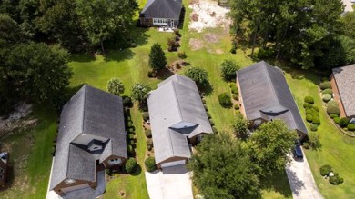 BEAUTIFUL PATIO HOME in gated Wyboo Plantation in the heart of on Players Course At Wyboo Plantation in South Carolina - for sale on GolfHomes.com, golf home, golf lot