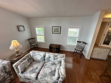 This 2-bedroom, 2 bathrooms Palm Harbor home is located on the on Del Tura Golf and Country Club in Florida - for sale on GolfHomes.com, golf home, golf lot