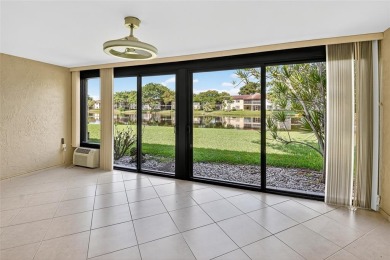 Welcome to this light and bright 2 bedroom, 2.5 bath townhouse on Boca Lago Golf and Country Club in Florida - for sale on GolfHomes.com, golf home, golf lot