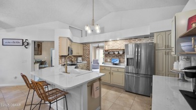 Stunning 3 bed, 2 bath home in the desirable Sugar Mill Country on Sugar Mill Country Club in Florida - for sale on GolfHomes.com, golf home, golf lot