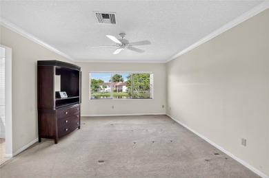 Welcome to this light and bright 2 bedroom, 2.5 bath townhouse on Boca Lago Golf and Country Club in Florida - for sale on GolfHomes.com, golf home, golf lot