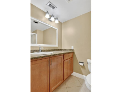 Welcome to this light and bright 2 bedroom, 2.5 bath townhouse on Boca Lago Golf and Country Club in Florida - for sale on GolfHomes.com, golf home, golf lot