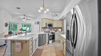 Stunning 3 bed, 2 bath home in the desirable Sugar Mill Country on Sugar Mill Country Club in Florida - for sale on GolfHomes.com, golf home, golf lot