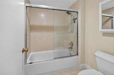 Welcome to this light and bright 2 bedroom, 2.5 bath townhouse on Boca Lago Golf and Country Club in Florida - for sale on GolfHomes.com, golf home, golf lot