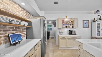 Stunning 3 bed, 2 bath home in the desirable Sugar Mill Country on Sugar Mill Country Club in Florida - for sale on GolfHomes.com, golf home, golf lot