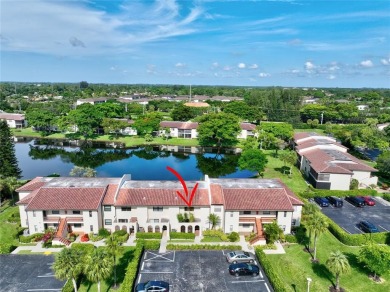 Welcome to this light and bright 2 bedroom, 2.5 bath townhouse on Boca Lago Golf and Country Club in Florida - for sale on GolfHomes.com, golf home, golf lot