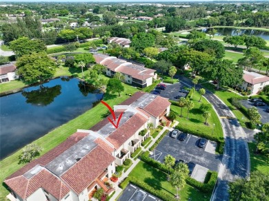 Welcome to this light and bright 2 bedroom, 2.5 bath townhouse on Boca Lago Golf and Country Club in Florida - for sale on GolfHomes.com, golf home, golf lot