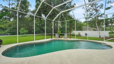 Stunning 3 bed, 2 bath home in the desirable Sugar Mill Country on Sugar Mill Country Club in Florida - for sale on GolfHomes.com, golf home, golf lot