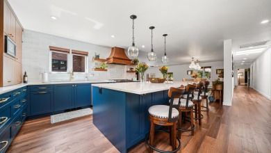 Welcome to 2022 Eagle Court, an immaculate executive ranch-style on Tiara Rado Golf Course in Colorado - for sale on GolfHomes.com, golf home, golf lot