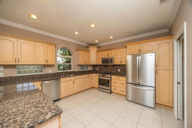 Set In A Quiet Cul-de-sac,This 3-bedroom,2.5-bath Lakefront Home on Marsh Creek Country Club in Florida - for sale on GolfHomes.com, golf home, golf lot