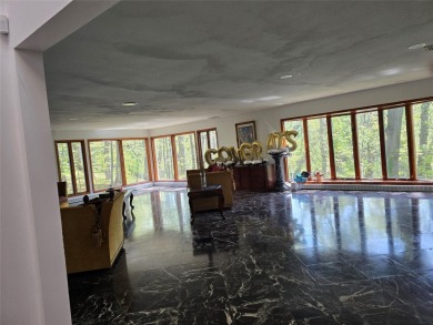A GRANITE STONE MANSION FULL OF NATURAL SUNLIGHT / CUSTOM BUILT on Lake Success Golf Club in New York - for sale on GolfHomes.com, golf home, golf lot