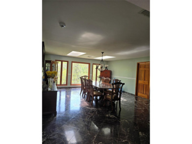 A GRANITE STONE MANSION FULL OF NATURAL SUNLIGHT / CUSTOM BUILT on Lake Success Golf Club in New York - for sale on GolfHomes.com, golf home, golf lot
