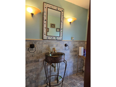 A GRANITE STONE MANSION FULL OF NATURAL SUNLIGHT / CUSTOM BUILT on Lake Success Golf Club in New York - for sale on GolfHomes.com, golf home, golf lot