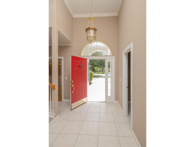 Set In A Quiet Cul-de-sac,This 3-bedroom,2.5-bath Lakefront Home on Marsh Creek Country Club in Florida - for sale on GolfHomes.com, golf home, golf lot